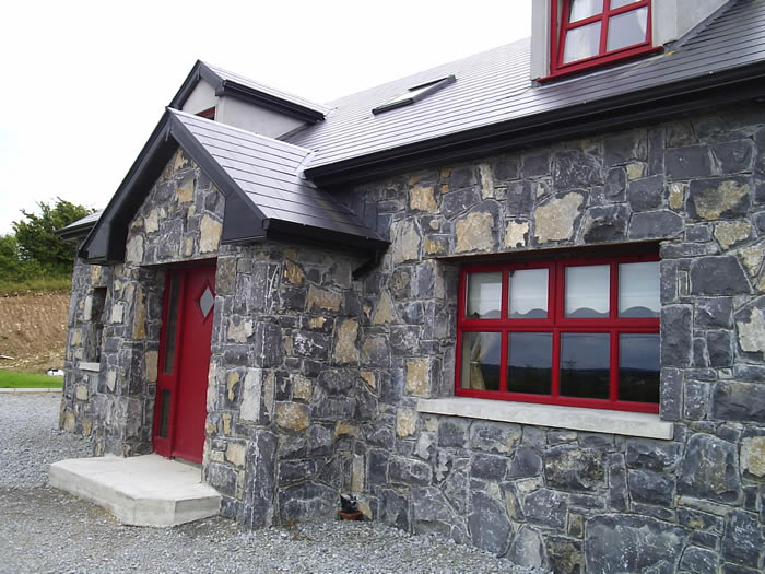 Limestone.Cladding.House.Red.Windows8.700.by.525